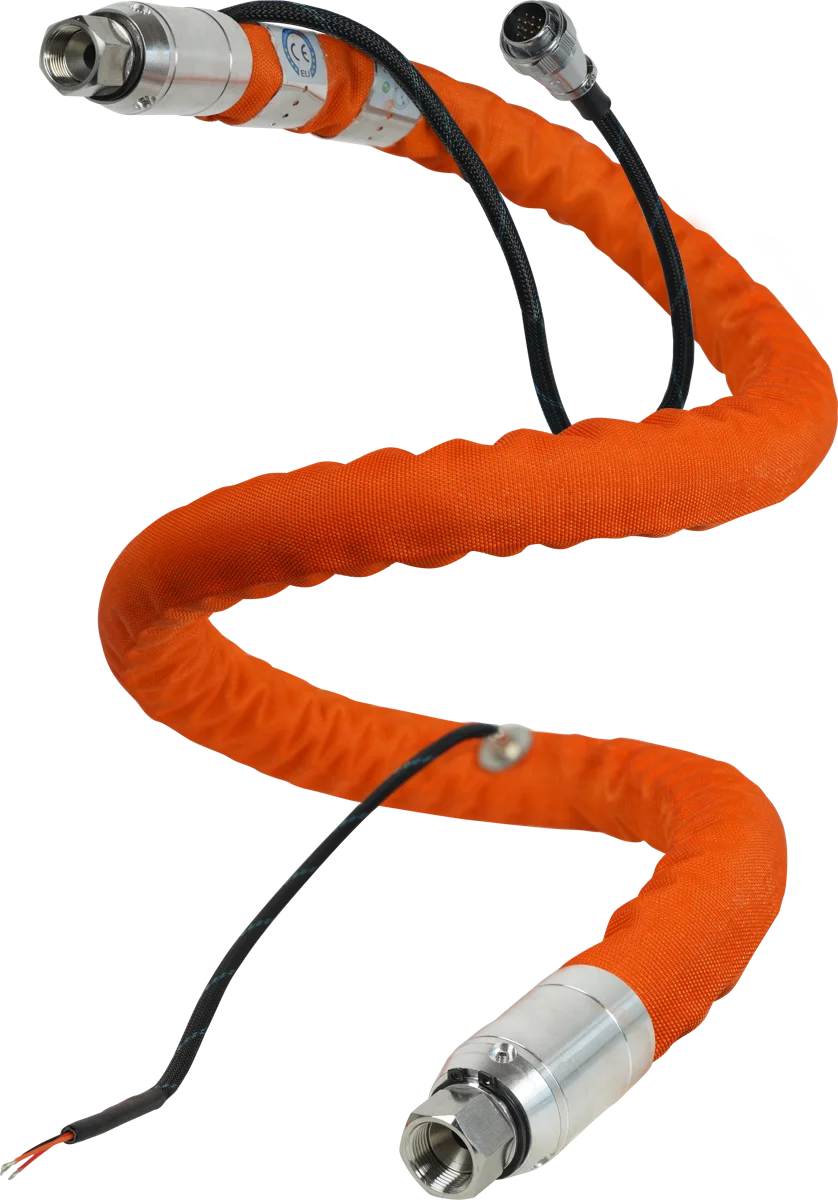 Heated hose with metal end housings